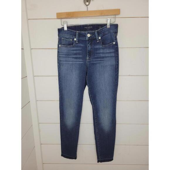 Lucky Brand Denim - Lucky Brand size 2/26 blue distressed mid rise skinny jeans. Ava